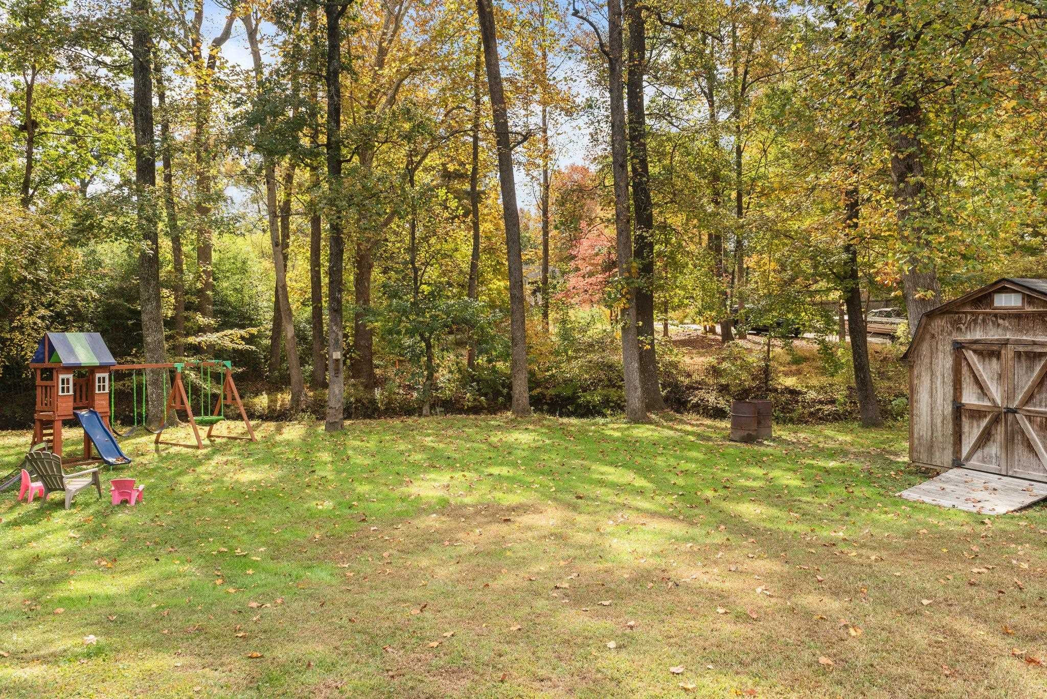 1818 Wellington Road Burlington, NC 27217 - Photo 36 of 36 a view of a yard with basketball court