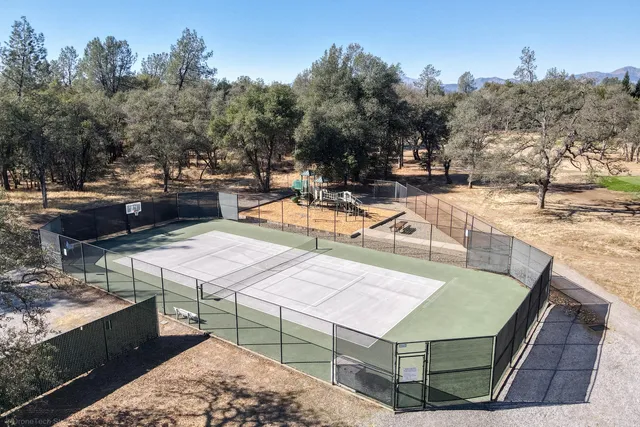 a view of a swimming pool with a lounge chairs