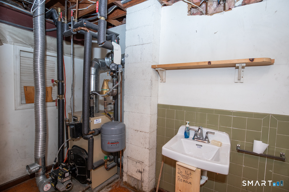 64 Somer Drive Meriden, CT 06451 - Photo 26 of 28 a bathroom with a sink toilet and shower