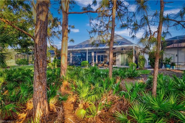 front view of a house with a small yard