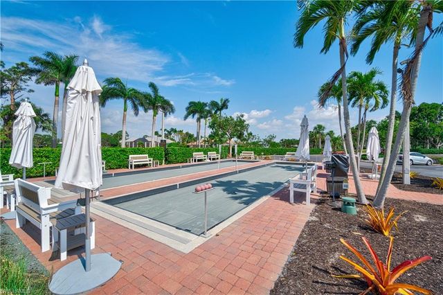 a view of a backyard with a patio