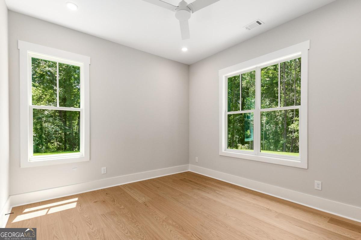 229 Eagles Way Eatonton, GA 31024 - Photo 23 of 61 an empty room with a window