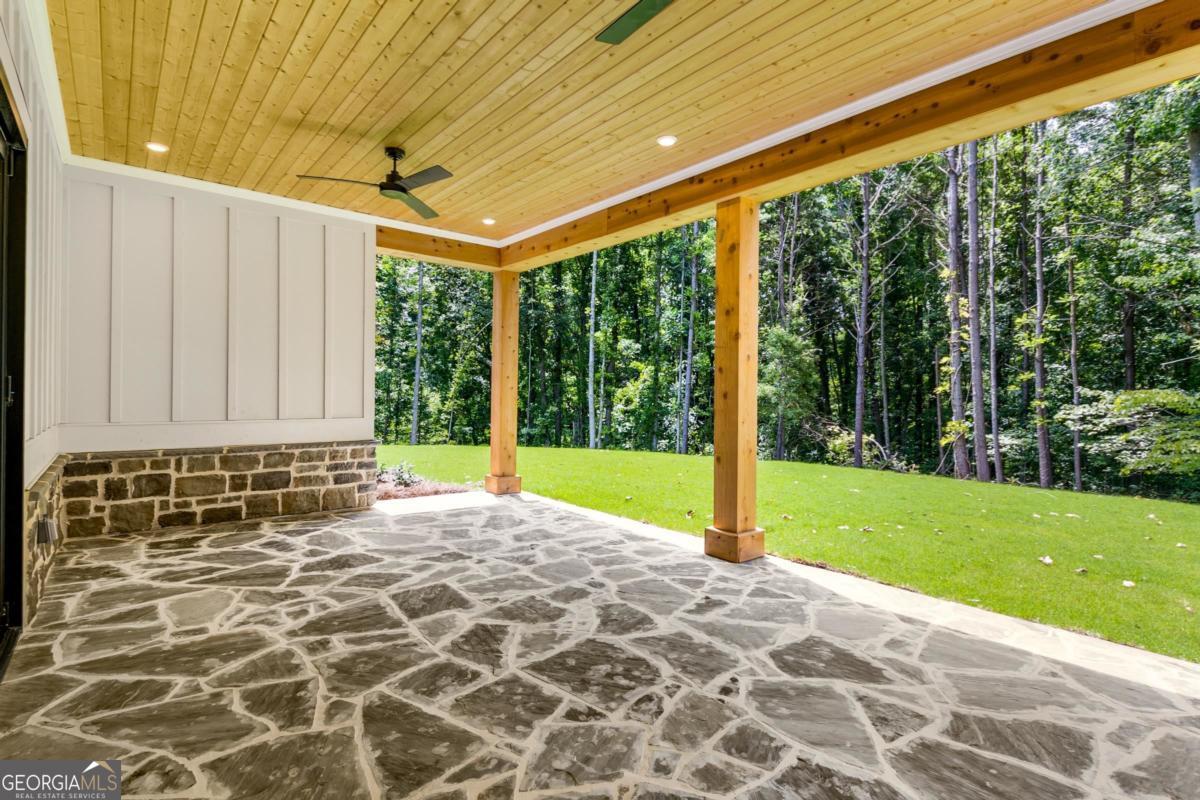 229 Eagles Way Eatonton, GA 31024 - Photo 36 of 61 a view of a porch with a backyard