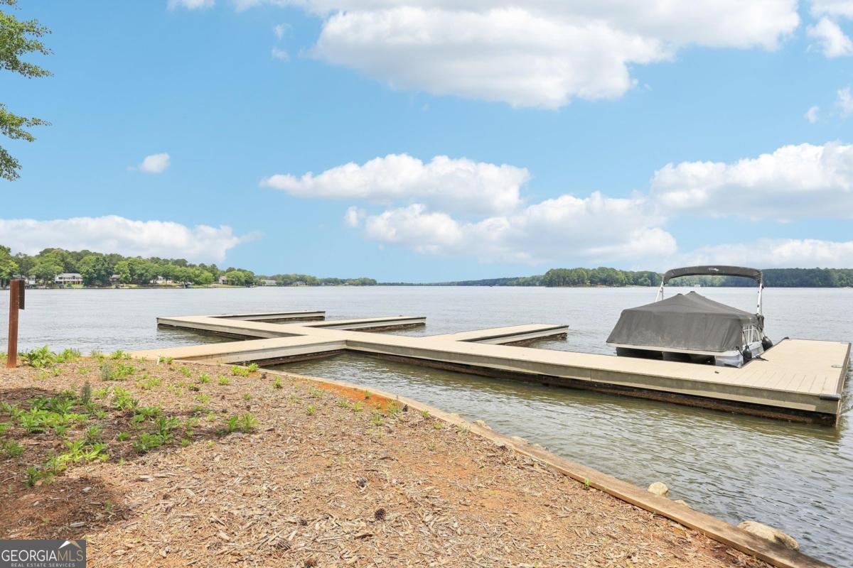 229 Eagles Way Eatonton, GA 31024 - Photo 37 of 61 a view of a lake with beach
