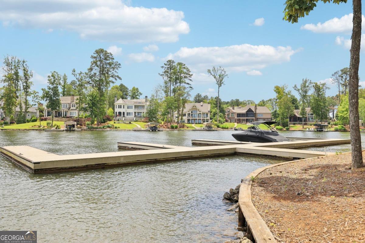 229 Eagles Way Eatonton, GA 31024 - Photo 41 of 61 a view of a swimming pool with outdoor seating