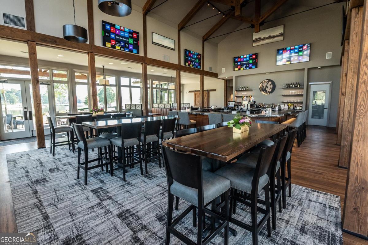229 Eagles Way Eatonton, GA 31024 - Photo 50 of 61 a view of a dining area with furniture window and outside view