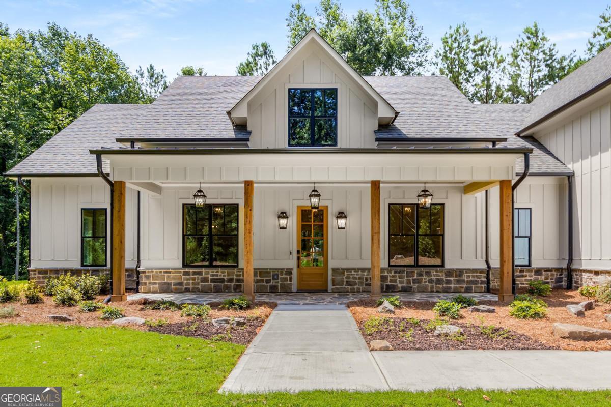 229 Eagles Way Eatonton, GA 31024 - Photo 5 of 61 front view of house with a yard