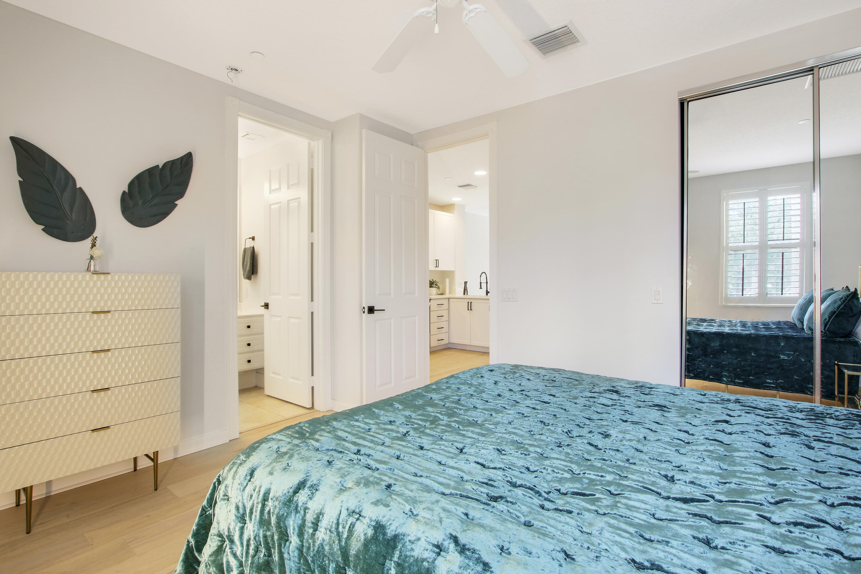 3424 West Community Drive Jupiter, FL 33458 - Photo 12 of 25 a bedroom with a bed and a window