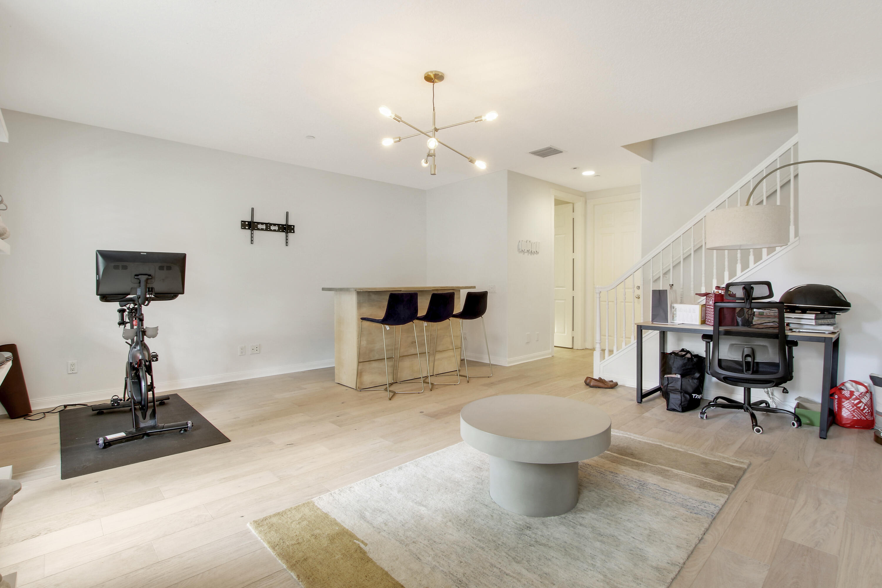 3424 West Community Drive Jupiter, FL 33458 - Photo 14 of 25 a living room with furniture and a toilet
