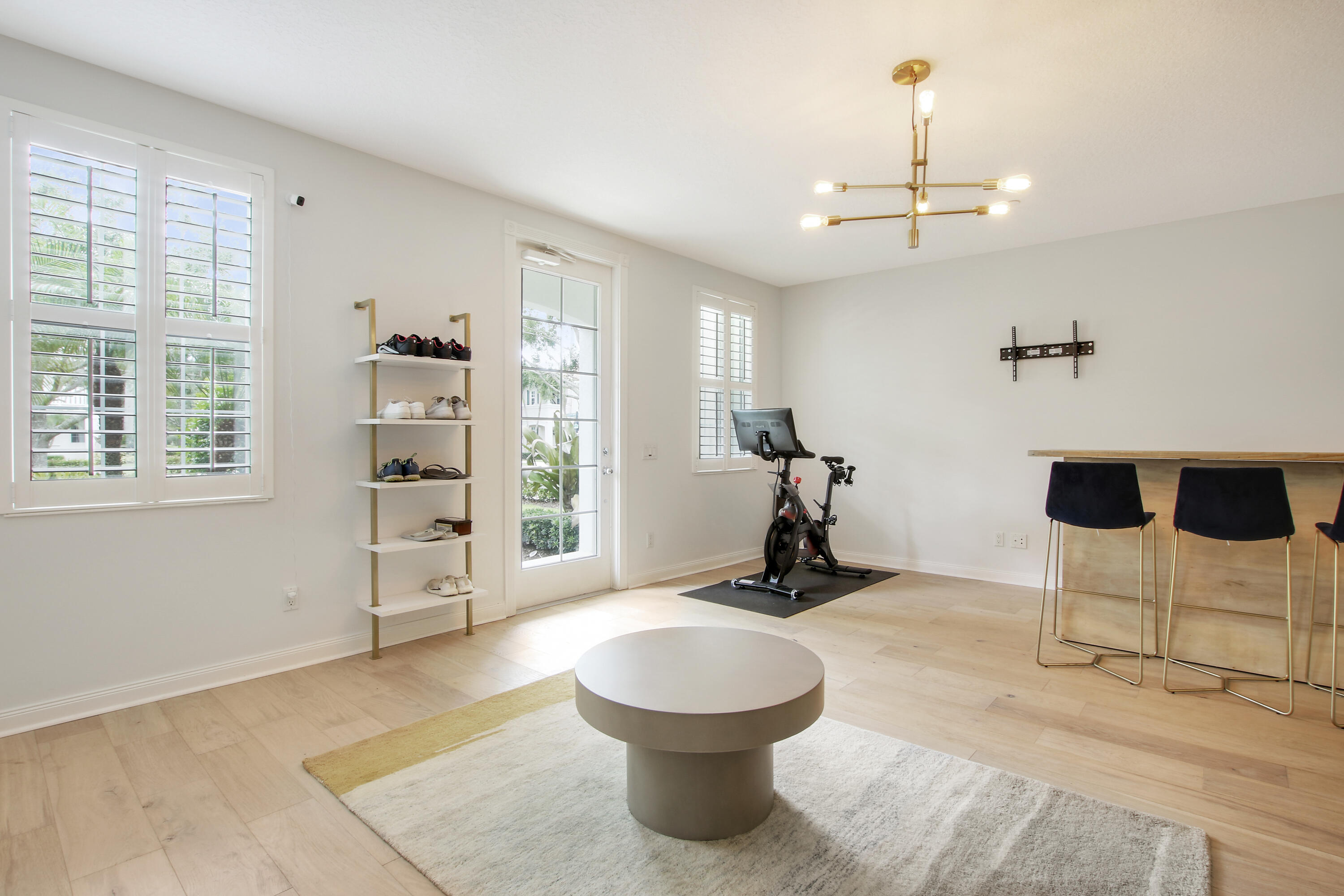 3424 West Community Drive Jupiter, FL 33458 - Photo 15 of 25 a living room with furniture a piano and a window