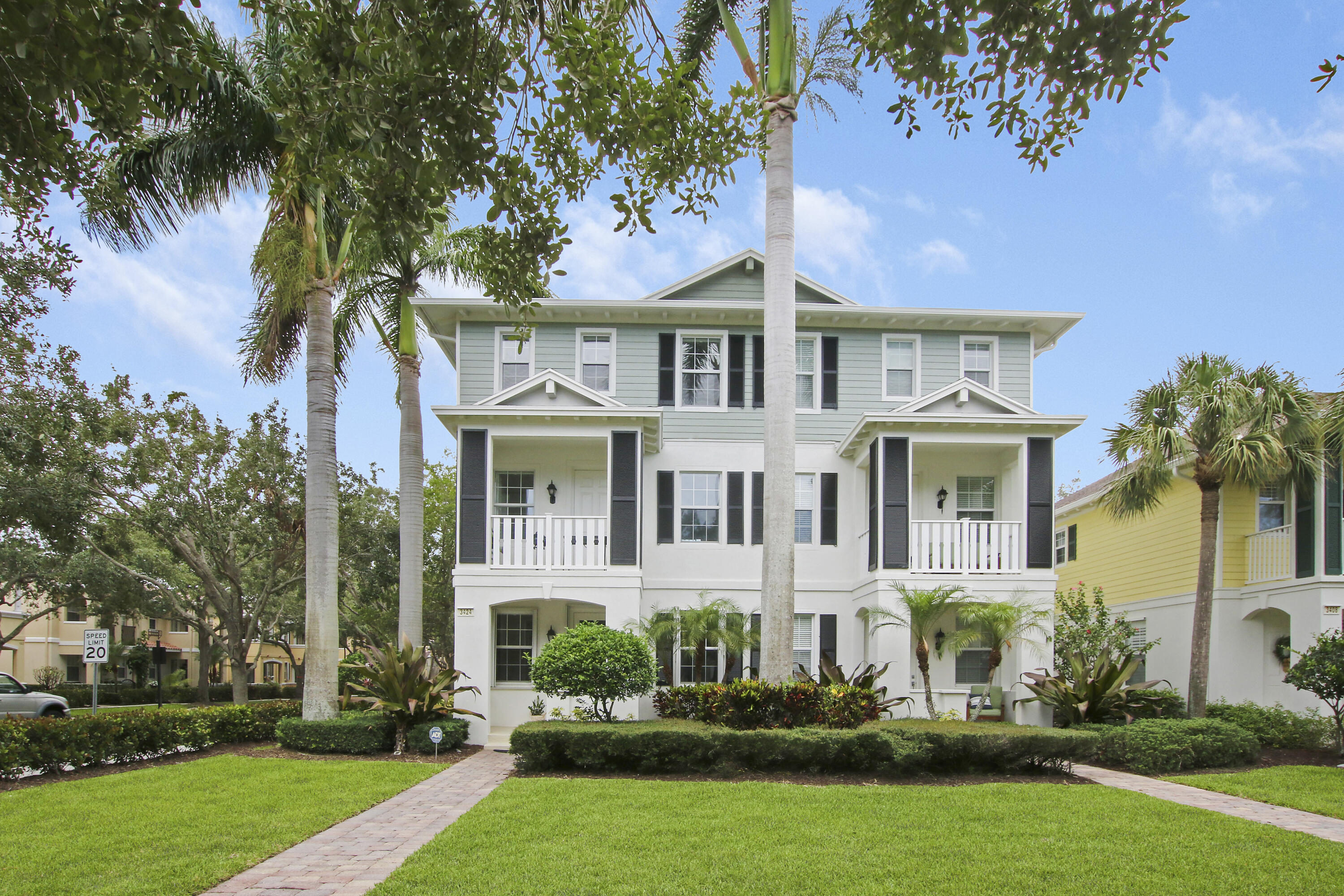 3424 West Community Drive Jupiter, FL 33458 - Photo 21 of 25 front view of a house with a yard