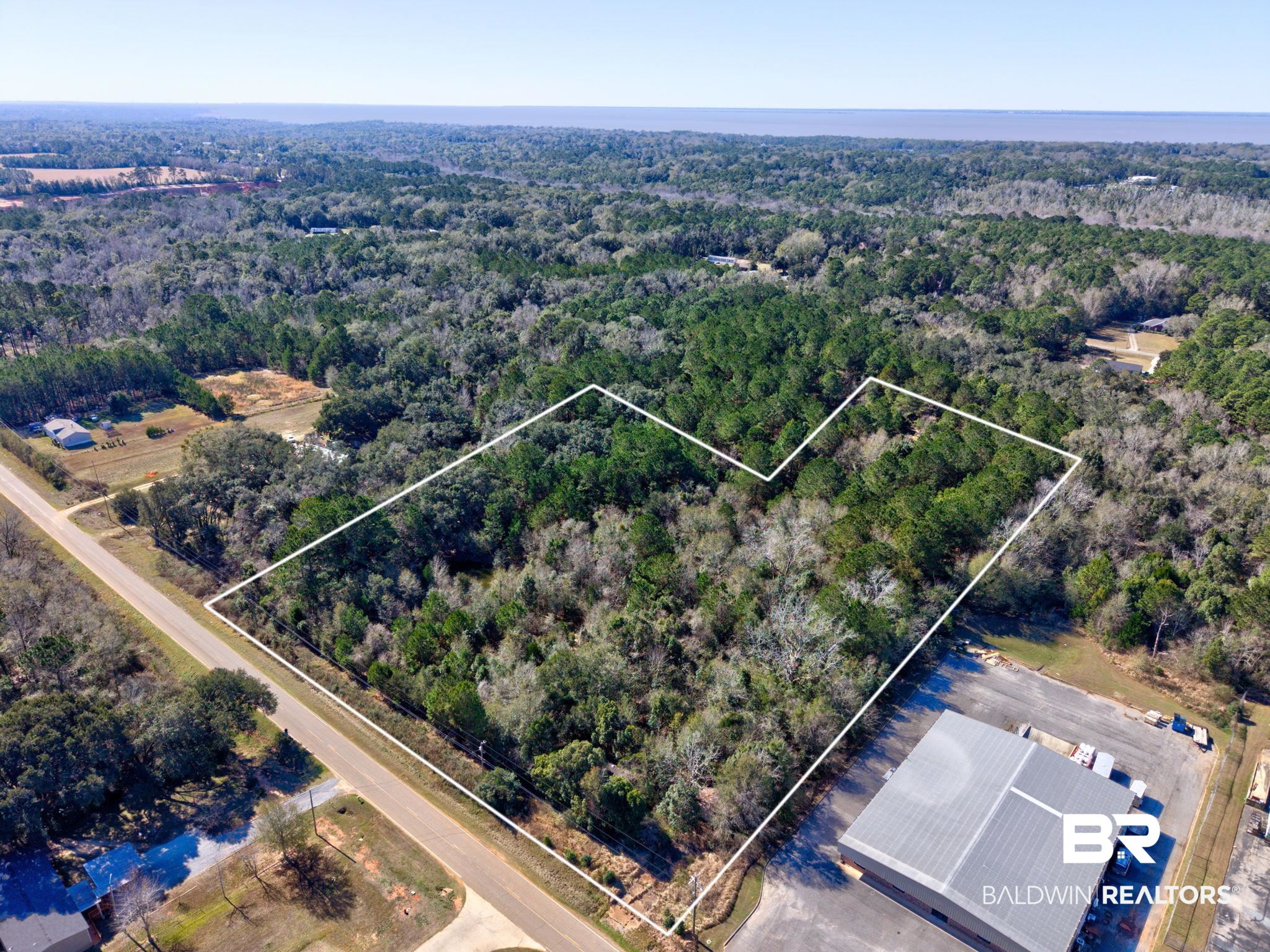 25280 Friendship Road Daphne, AL 36526 - Photo 3 of 34 View of property location with a heavily wooded area and property boundaries highlighted