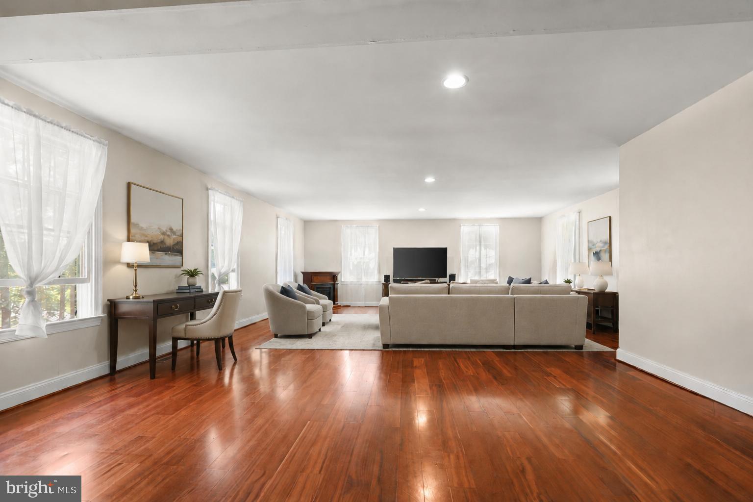 1601 Rushing Stream Court Forest Hill, MD 21050 - Photo 34 of 72 Family Room w/ hardwood - virtual partial staging