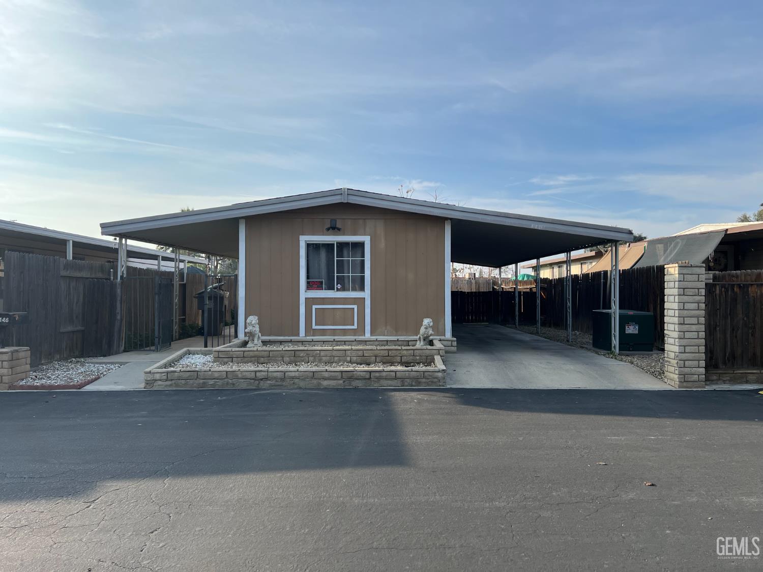 Undisclosed Address Bakersfield, CA 93309 - Photo 1 of 14 a view of a house with a street