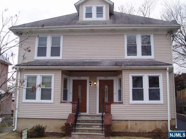 71-73 Bloomfield Avenue, Unit 71LEFT SIDE River Edge, NJ 07661 - Photo 1 of 7 a front view of a house