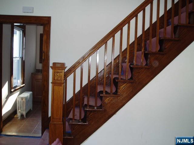 71-73 Bloomfield Avenue, Unit 71LEFT SIDE River Edge, NJ 07661 - Photo 5 of 7 a view of entryway with wooden floor and a front door