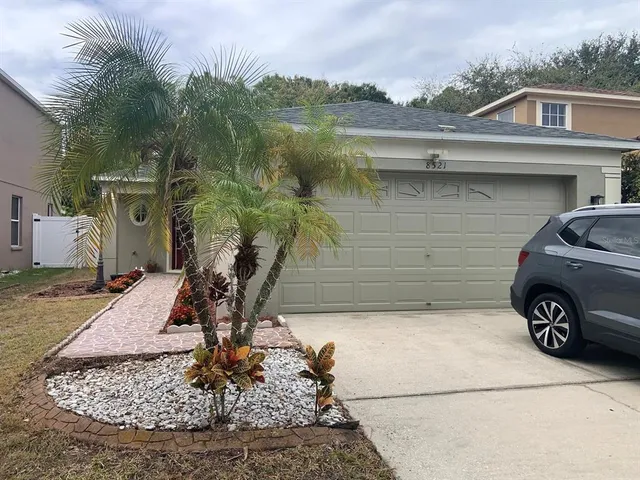 a car parked in front of a house