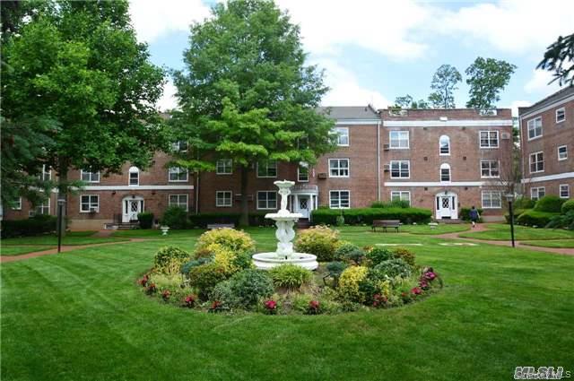 Surrounding community featuring a lawn
