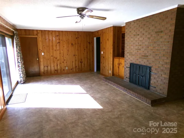 a view of livingroom with furniture and a window