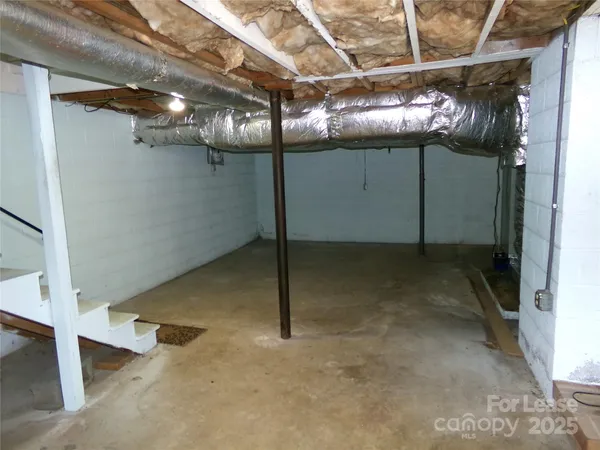a view of a room with a garage