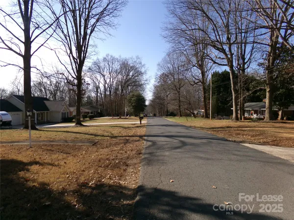 a view of road with trees