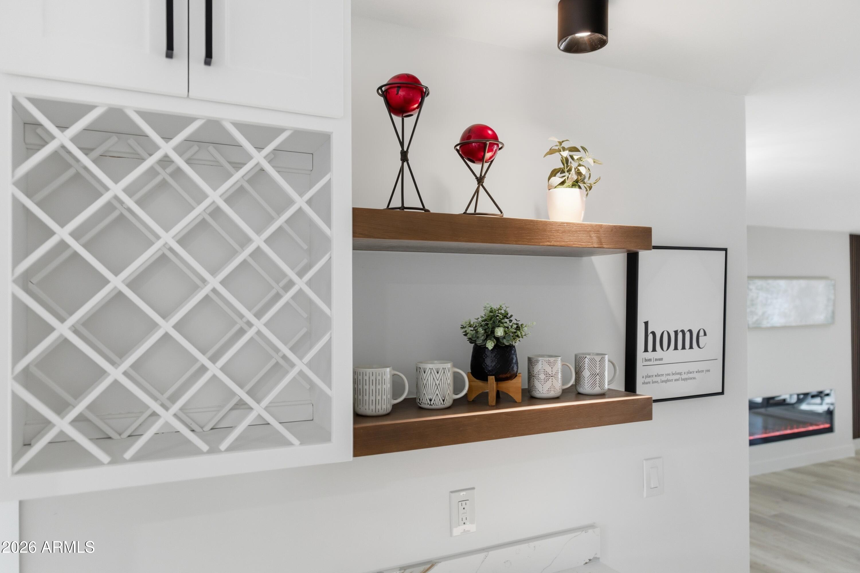 7761 East Chaparral Road Scottsdale, AZ 85250 - Photo 27 of 36 view of a room with wooden floor and potted plant