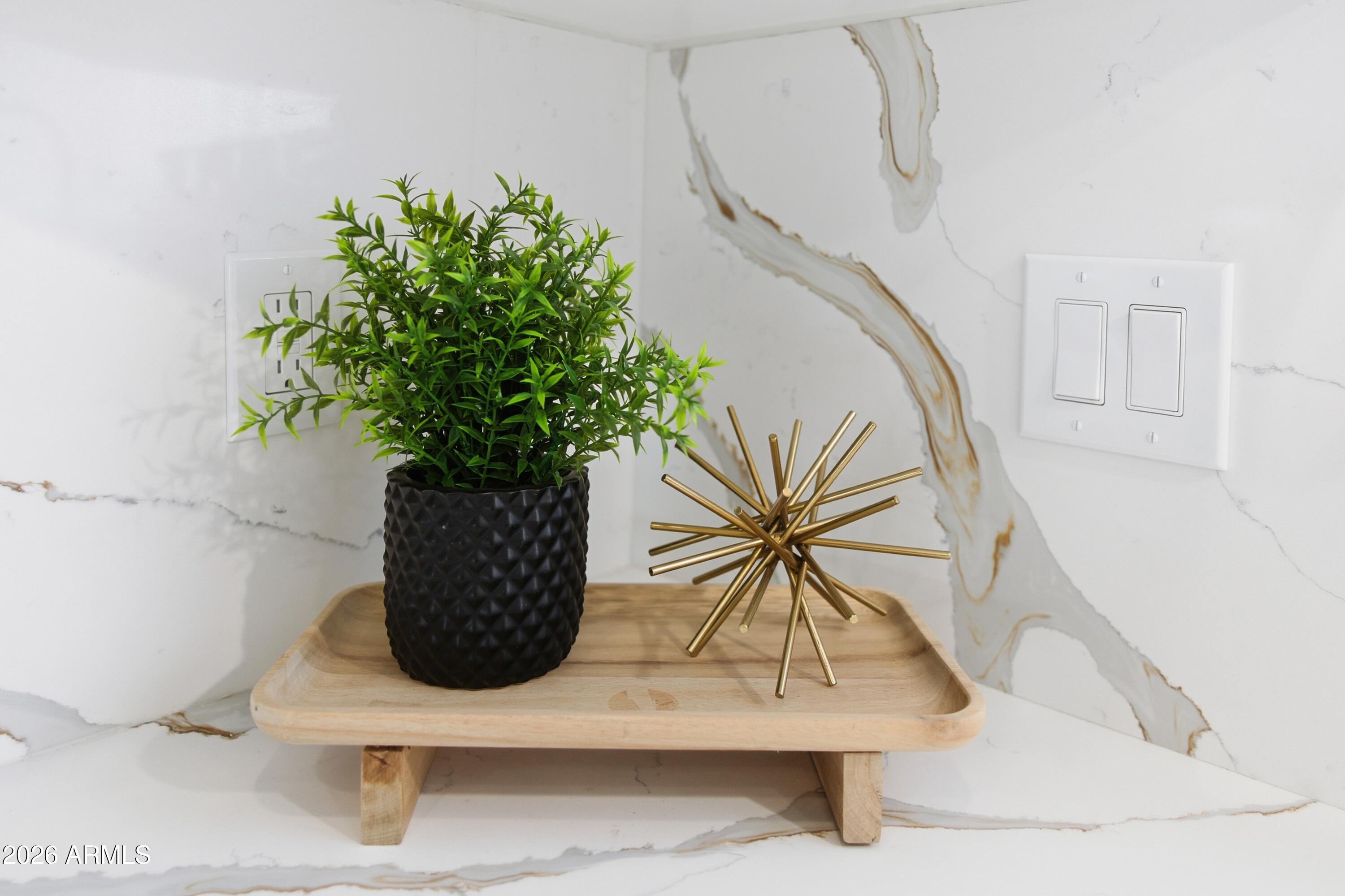 7761 East Chaparral Road Scottsdale, AZ 85250 - Photo 29 of 36 a vase of flowers sitting on a table