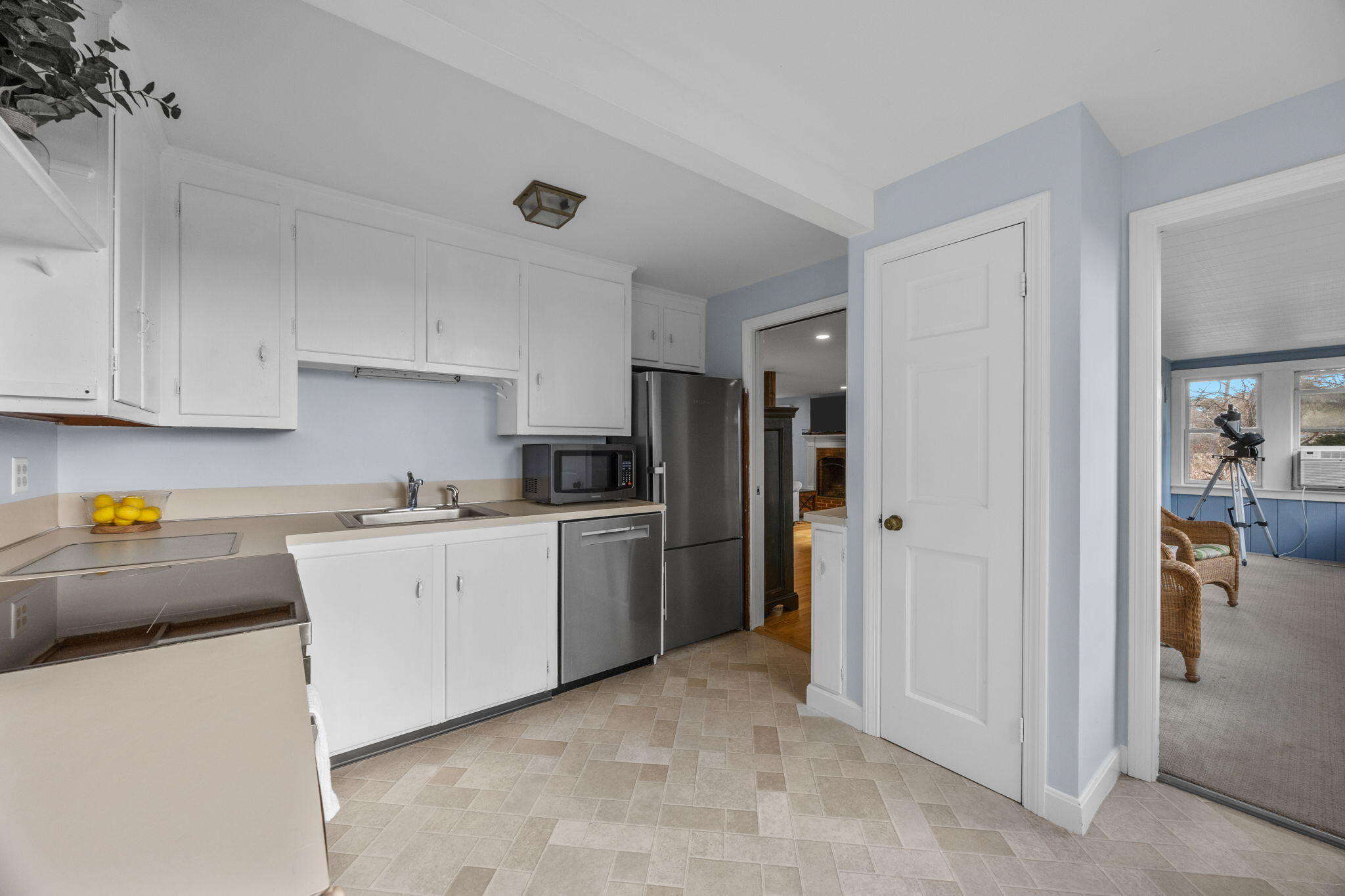 144 Barn Hill Road Chatham, MA 02633 - Photo 11 of 24 a kitchen with stainless steel appliances granite countertop a refrigerator and a stove top oven