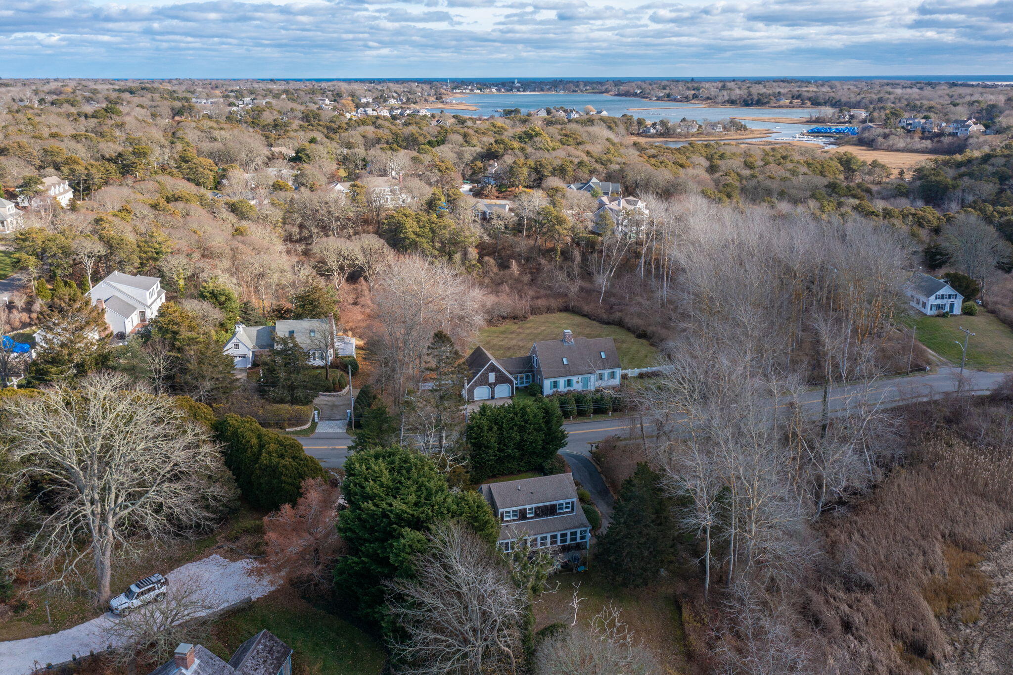 144 Barn Hill Road Chatham, MA 02633 - Photo 23 of 24 an aerial view of a house with a yard