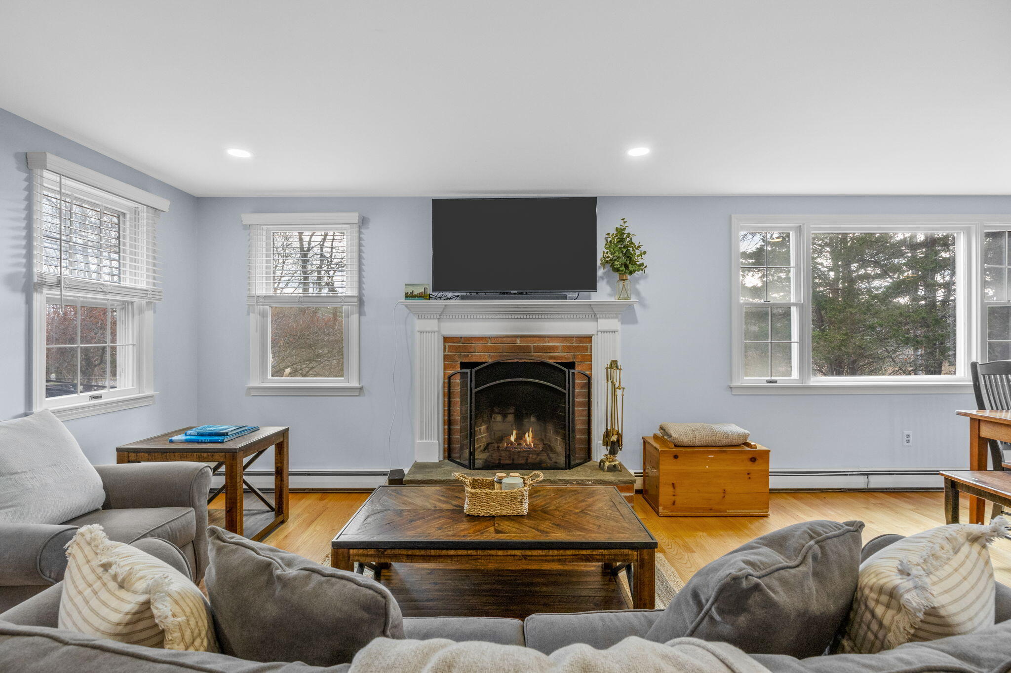 144 Barn Hill Road Chatham, MA 02633 - Photo 7 of 24 a living room with furniture window and a fireplace