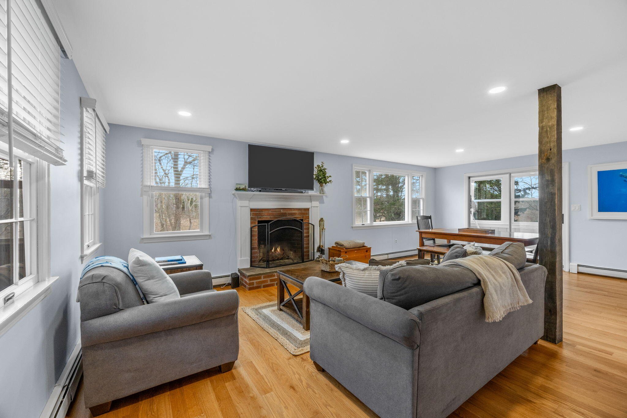 144 Barn Hill Road Chatham, MA 02633 - Photo 8 of 24 a living room with furniture and a fireplace