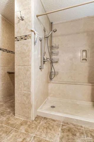 a bathroom with a sink mirror vanity and toilet