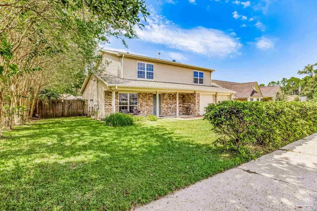 a view of a porch with furniture