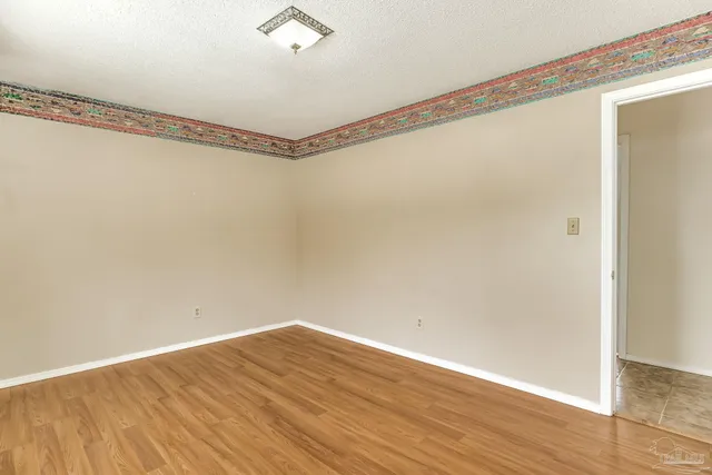 a front view of a house with a yard table and chairs