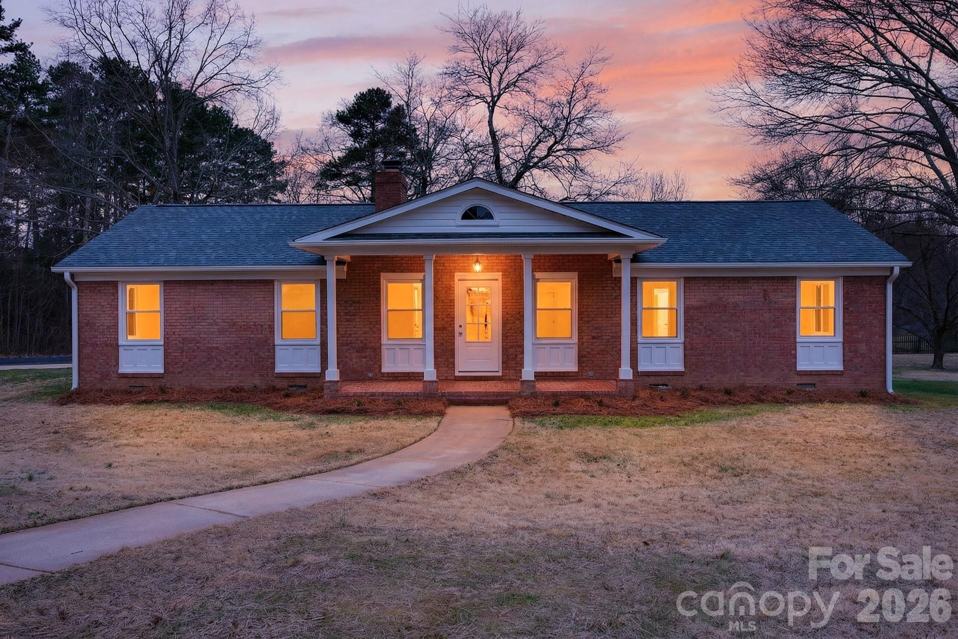 235 Lariat Circle Salisbury, NC 28144 - Photo 1 of 45 a house with trees in the background