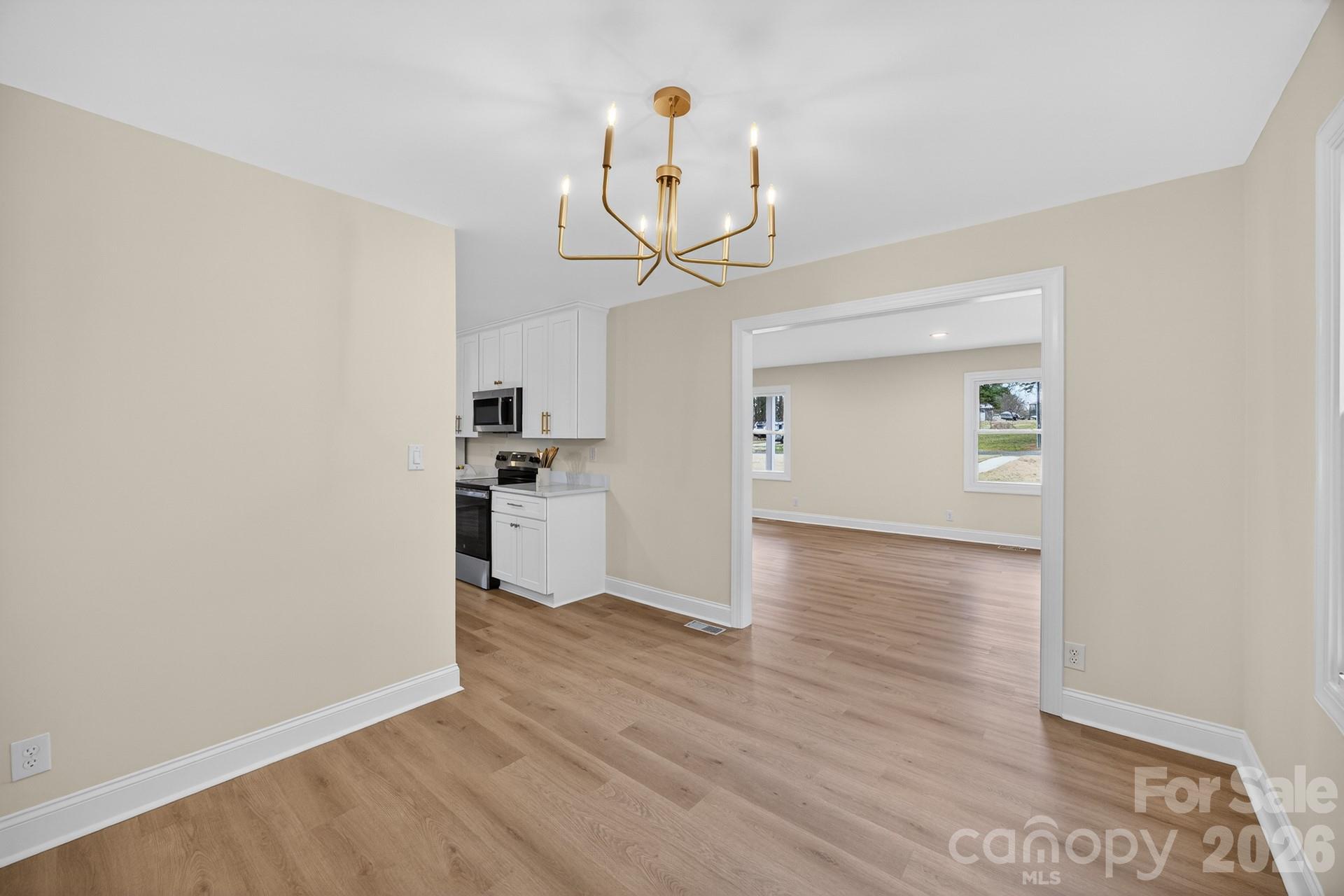 235 Lariat Circle Salisbury, NC 28144 - Photo 30 of 45 a view of a kitchen with wooden floor and a window