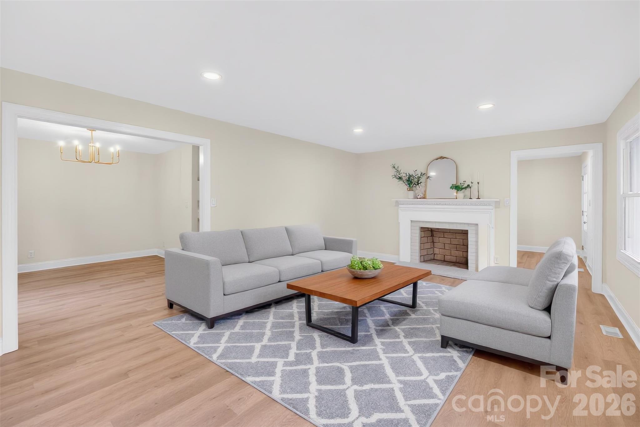 235 Lariat Circle Salisbury, NC 28144 - Photo 4 of 45 a living room with furniture and a fireplace