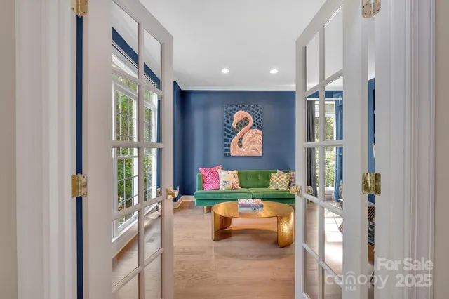 a living room with furniture and a window