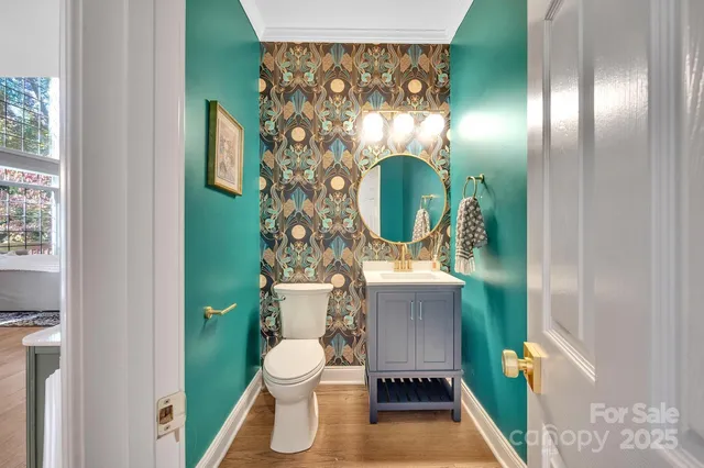 a bath tub sitting in a bathroom next to a toilet
