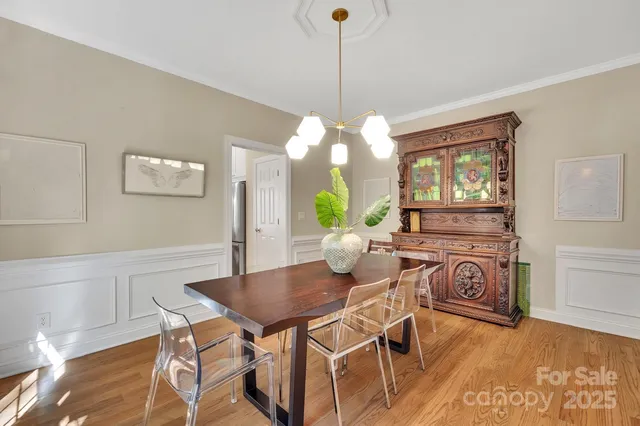 a white toilet sitting next to a shower curtain