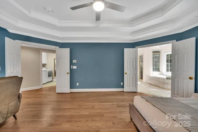 a view of balcony with wooden floor and fence