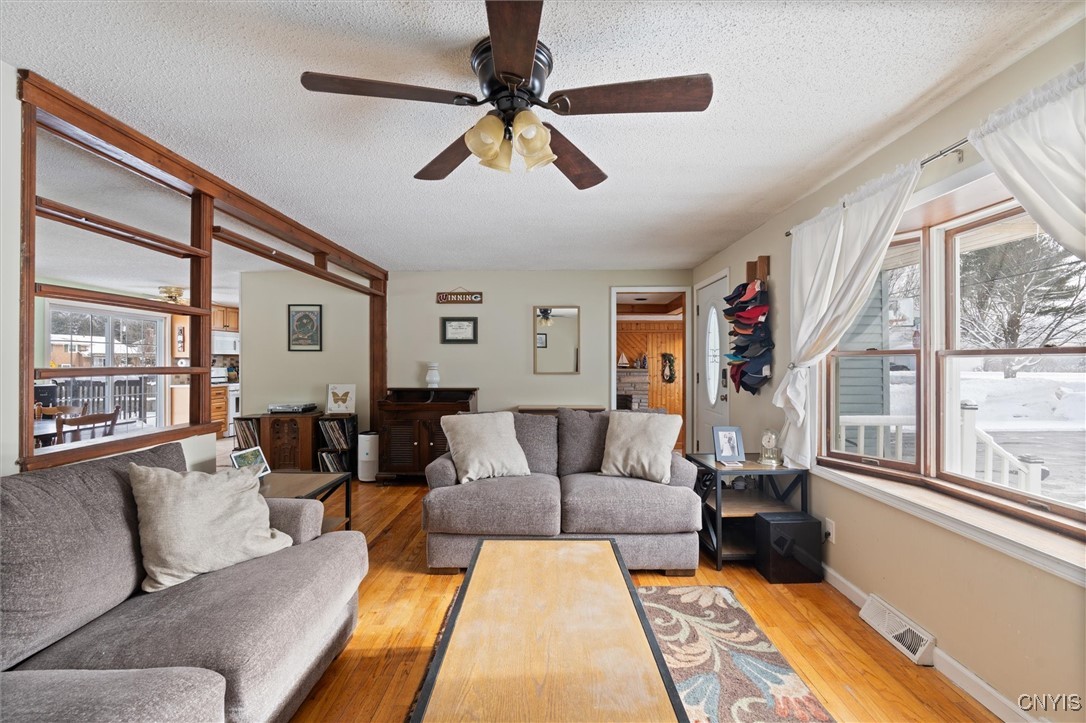 5793 West Pine Grove Road Cicero, NY 13039 - Photo 3 of 42 Beautiful hardwood floors across the first floor a
