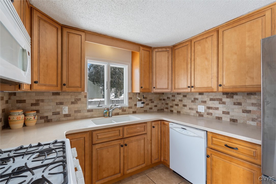 5793 West Pine Grove Road Cicero, NY 13039 - Photo 6 of 42 full kitchen with lots of storage and countertop s