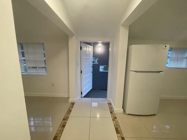 919 2nd Street, Unit 3 West Palm Beach, FL 33401 - Photo 9 of 11 a view of a hallway