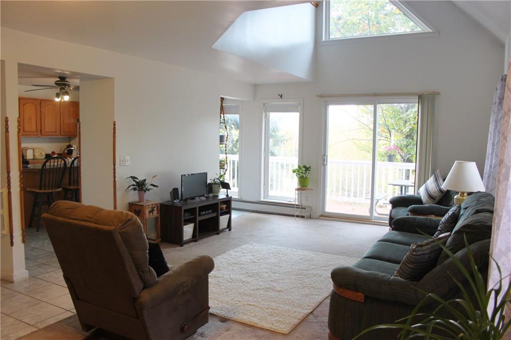 207 Jack Hall Road New Gloucester, ME 04260 - Photo 8 of 42 semi open to kitchen makes...