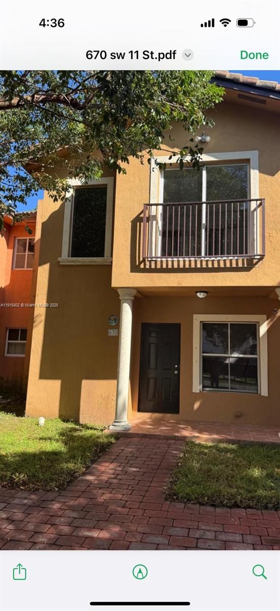 657 Southwest 10th Street, Unit 657 Florida City, FL 33034 - Photo 2 of 12 a view of a house with a yard