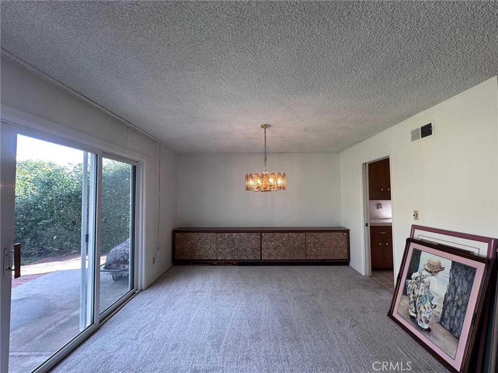 20631 Romar Street Chatsworth, CA 91311 - Photo 13 of 34 a view of room with window and wooden floor