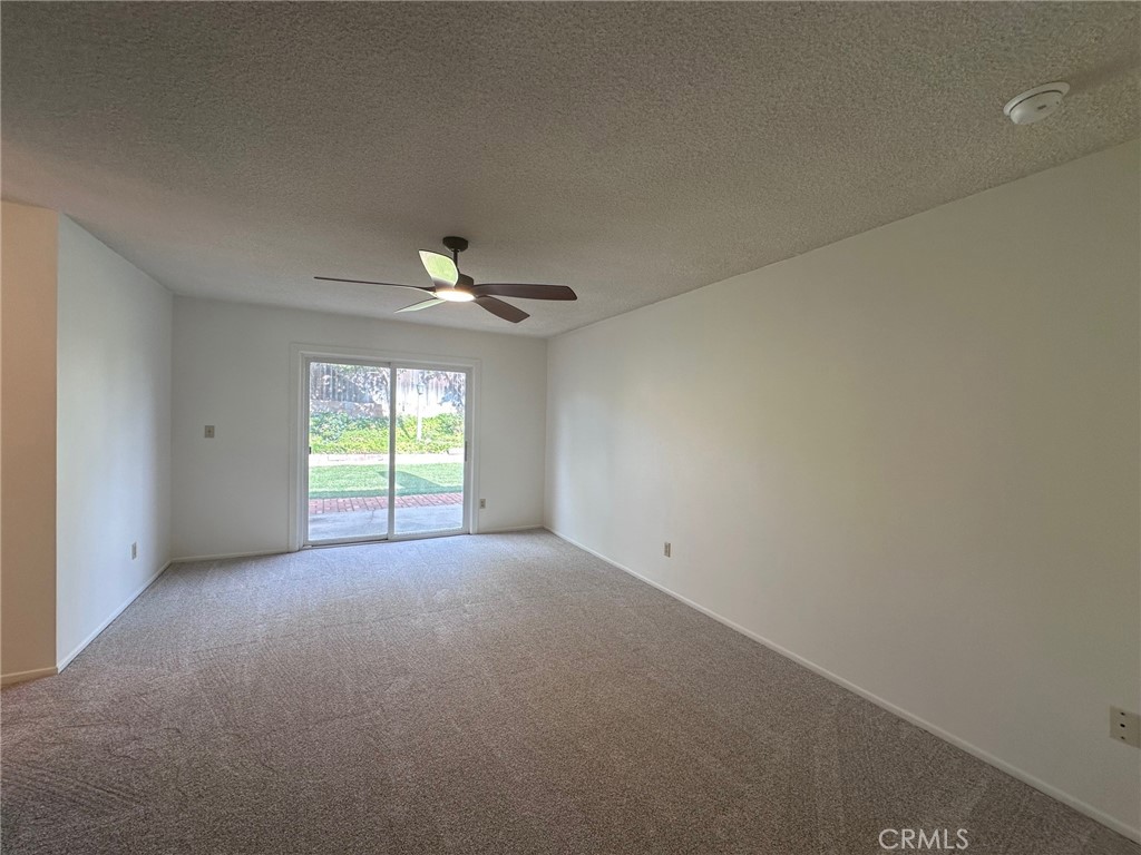 20631 Romar Street Chatsworth, CA 91311 - Photo 17 of 34 a view of an empty room with a window