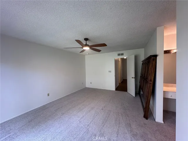 a view of a livingroom with a staircase