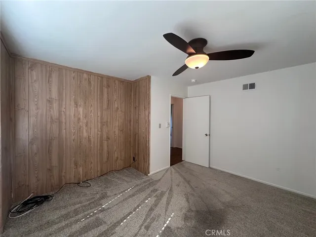 a view of an empty room and painted walls